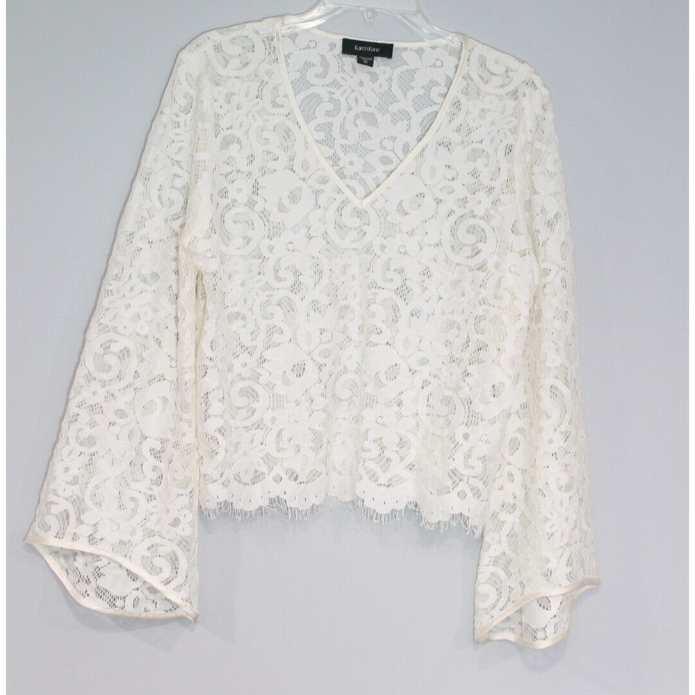 Karen Kane Semi Sheer Lace Top Womens size M Ivory Floral Bell Sleeve Fringe Hem